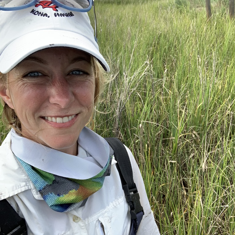 Photo of Dr. Kelly Gibson in the field.