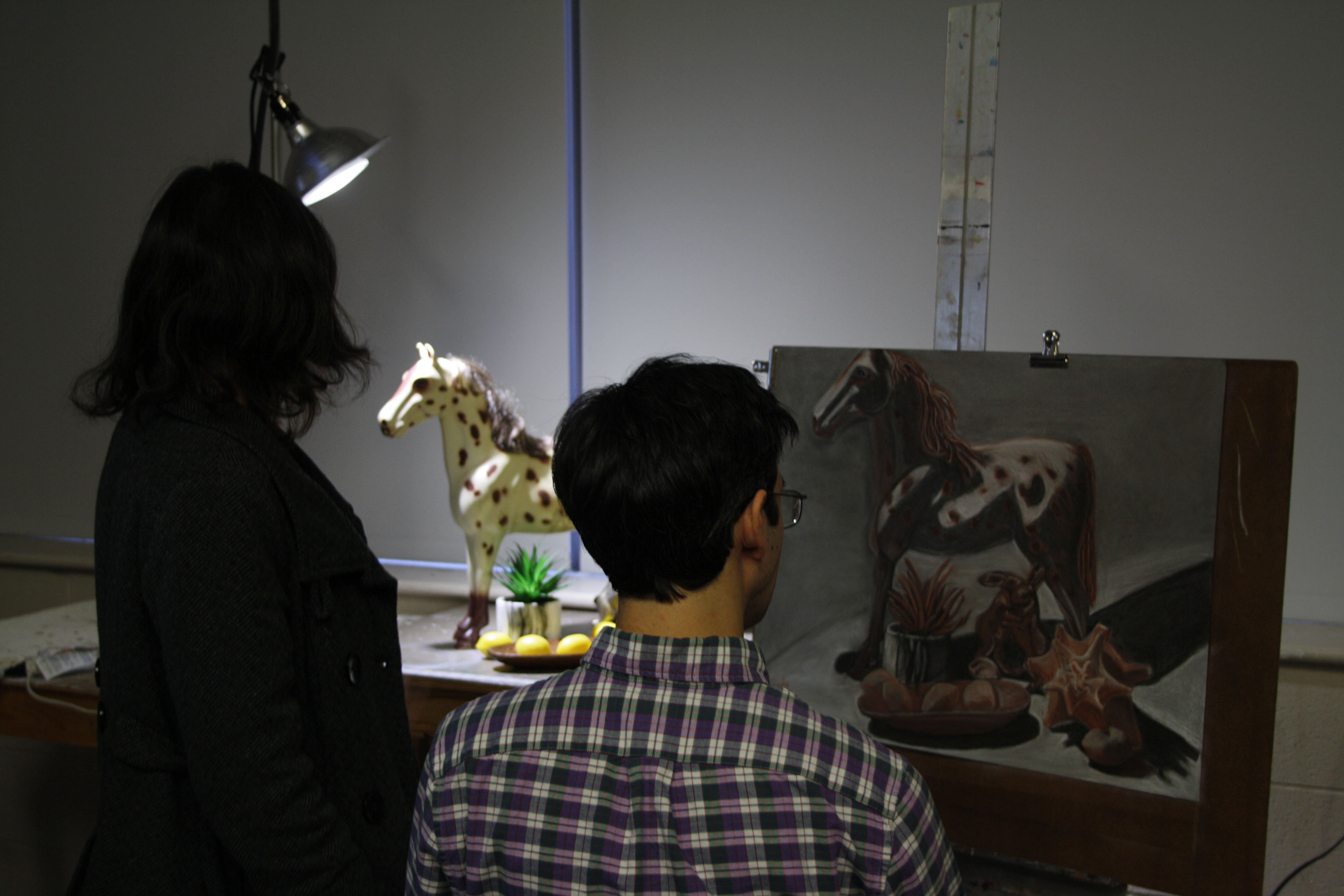photo of art professor with student