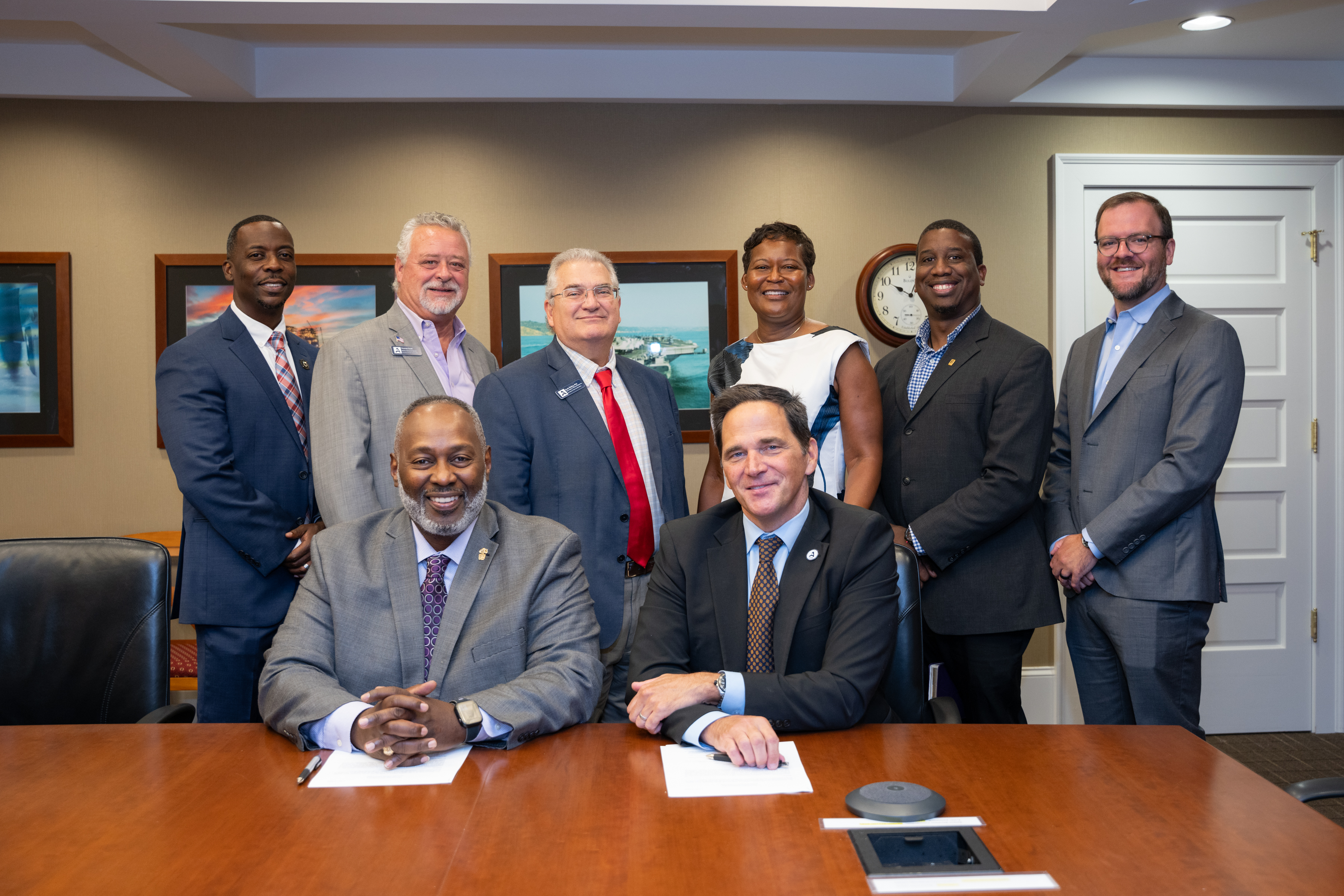 Savannah River Nuclear Solutions Executive Vice President Sean Alford and USCA Chancellor Daniel Heimmermann came together with their teams to sign a memorandum of agreement in the SRNS downtown Aiken office