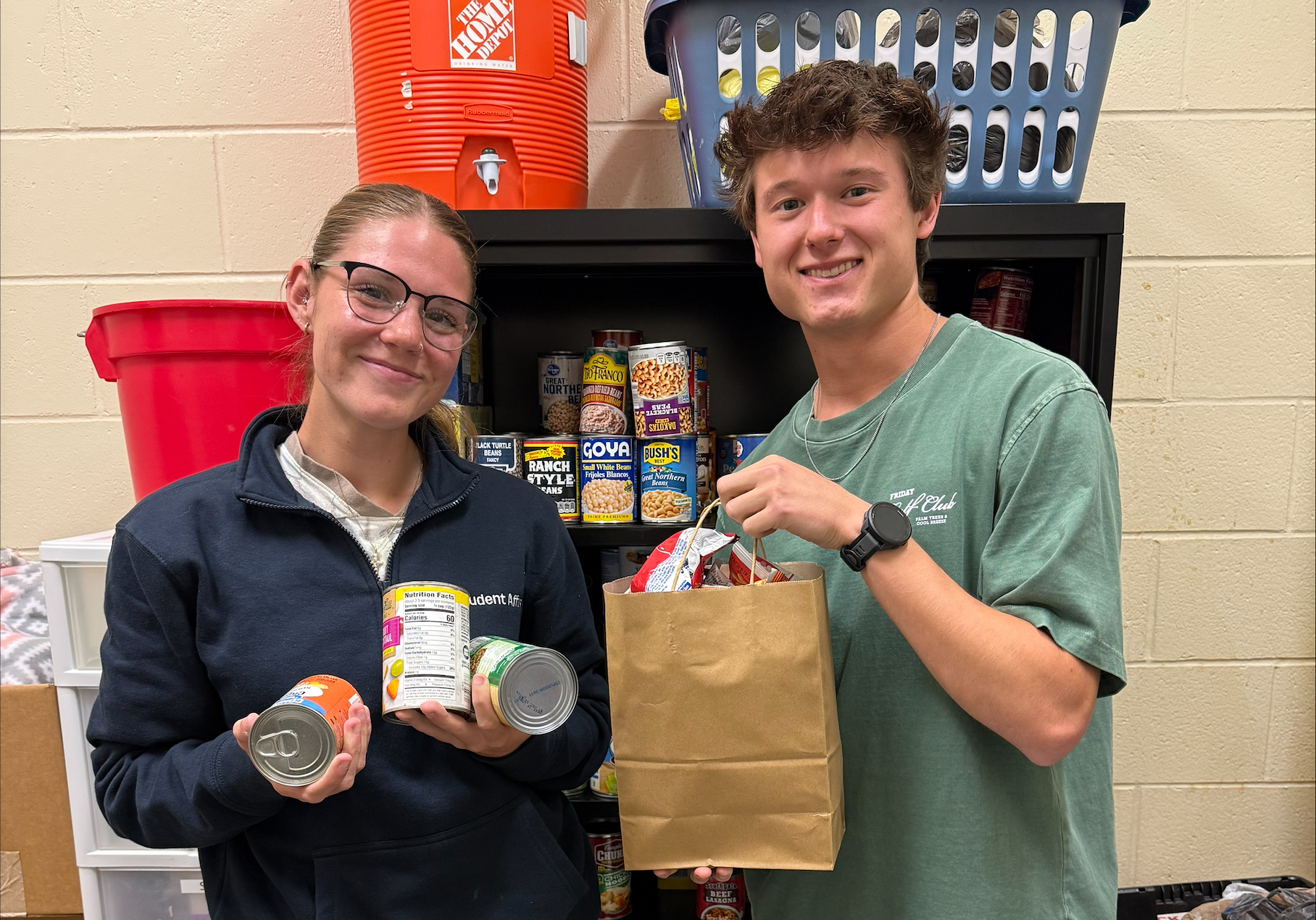 From left, USCA students Avonlea Davis and Avery Farthing prepare food bags for fellow Pacers.  (Courtesy photo)