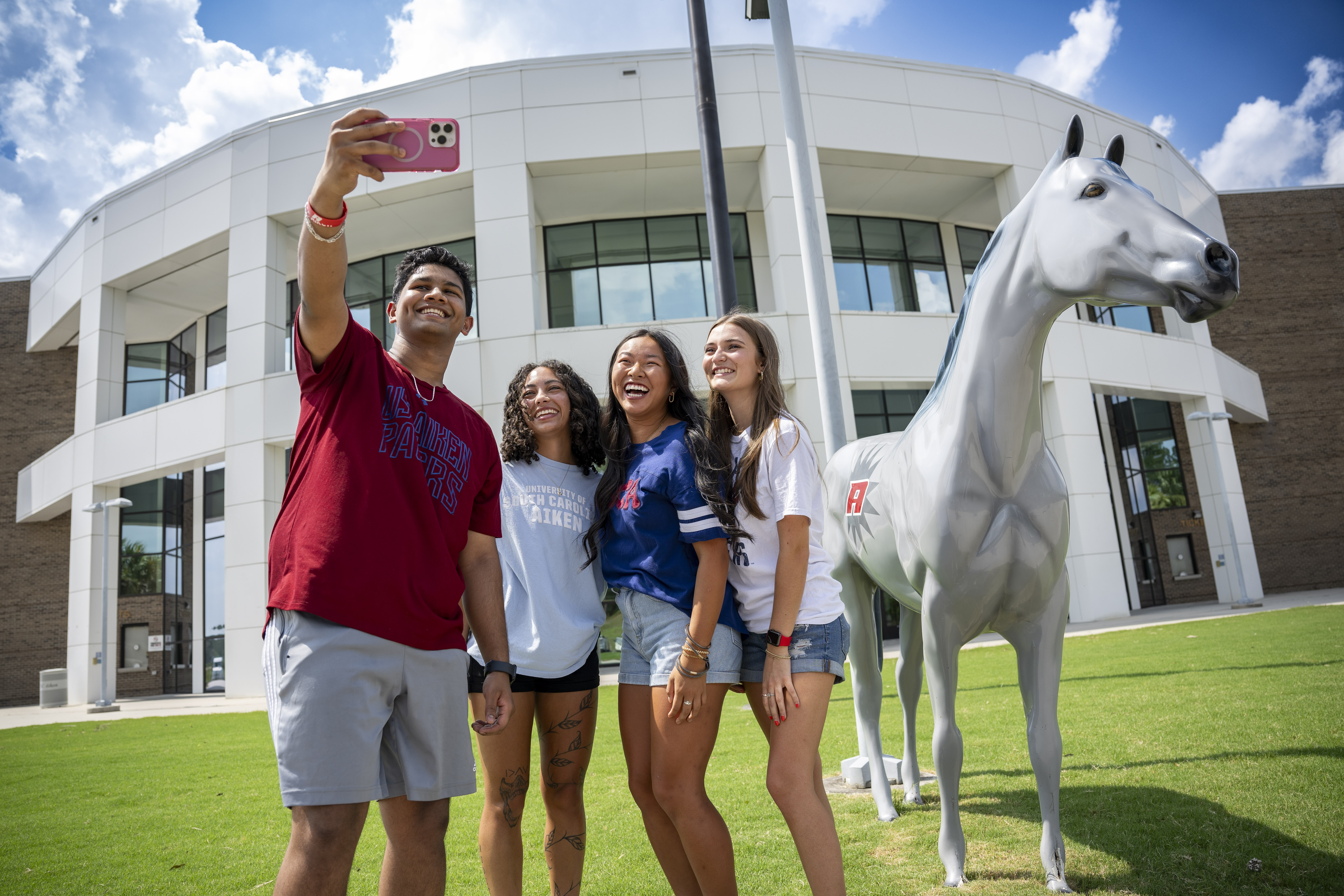 Group of students pose for selfie